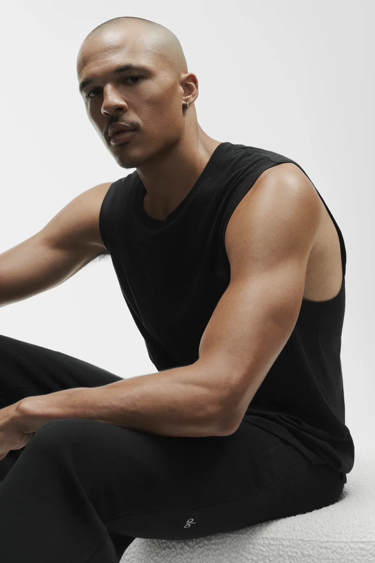 The Triumph Muscle Tank Top