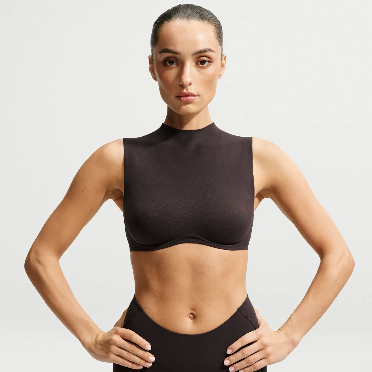 SKIMS Studio Stretch Light-Support Mock Neck Sports Bra by Nike