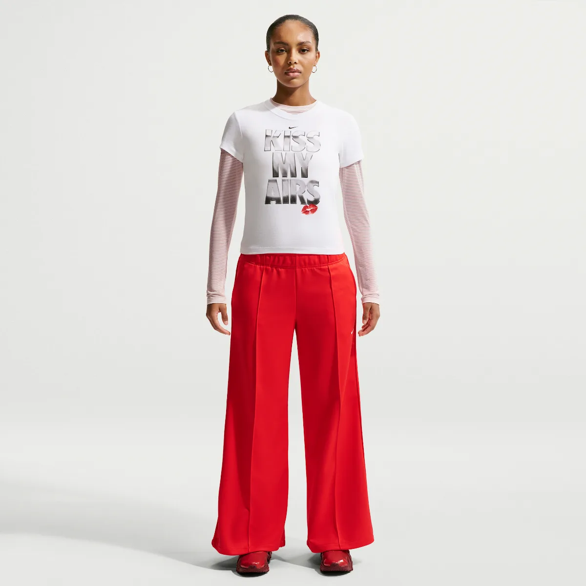 Sportswear Mid-Rise Wide-Leg Track Pants by Nike