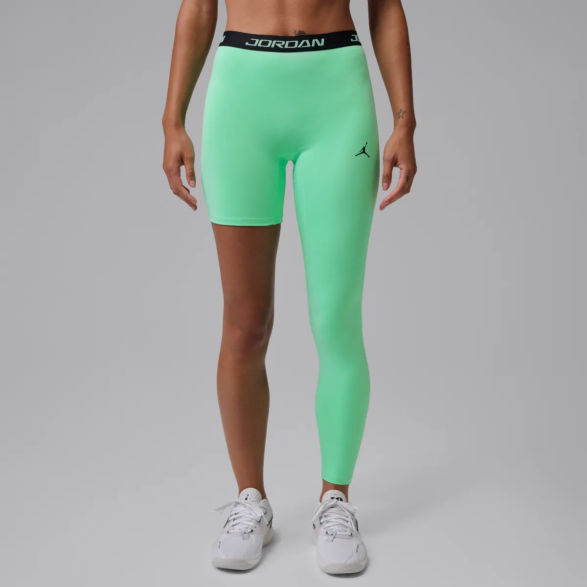 Jordan Sport High-Rise Single-Leg Basketball Tights (left) by Jordan