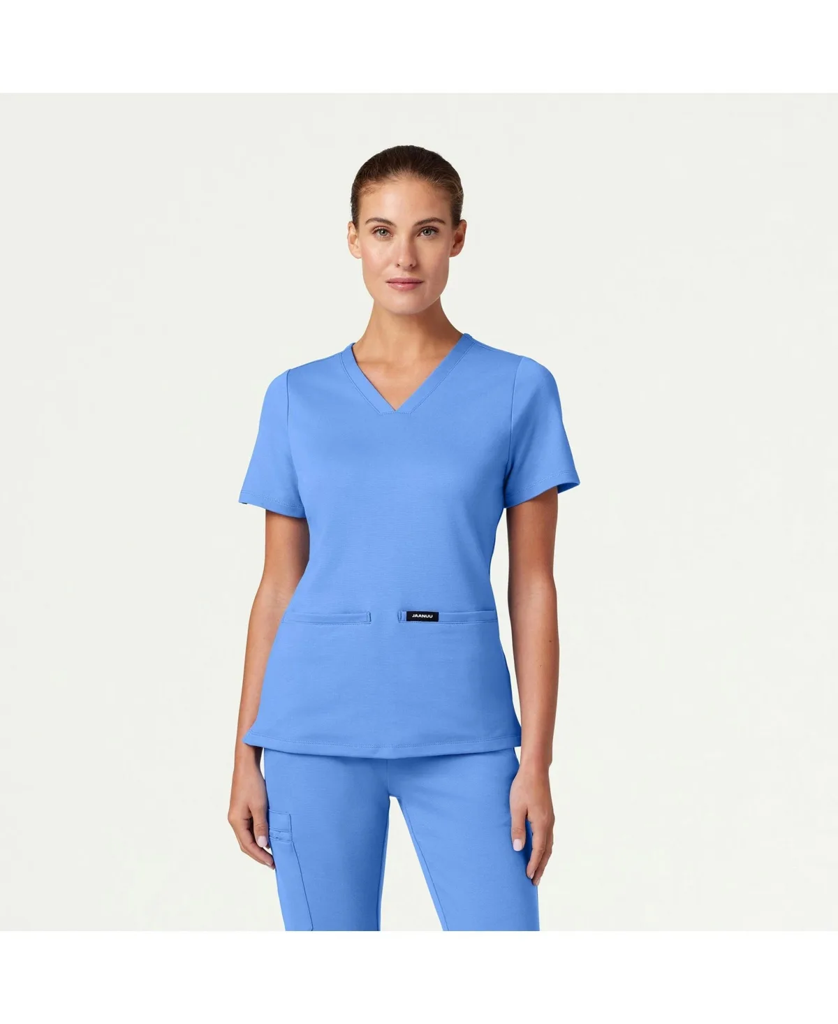 Cesi 2-Pocket Slim Knit V-Neck Scrub Top by Jaanuu