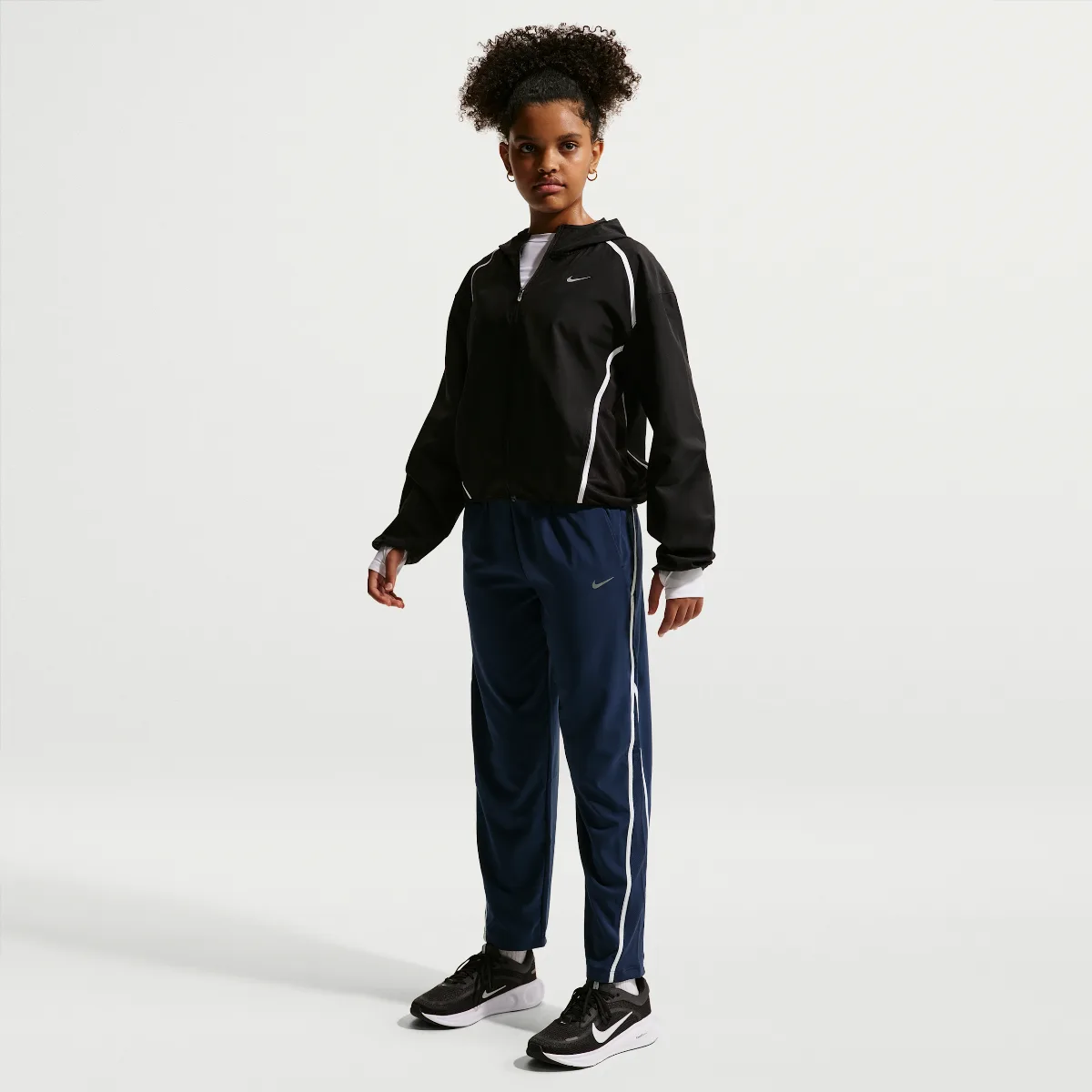 Tempo Dri-FIT Mid-Rise 7/8-Length Pants by Nike