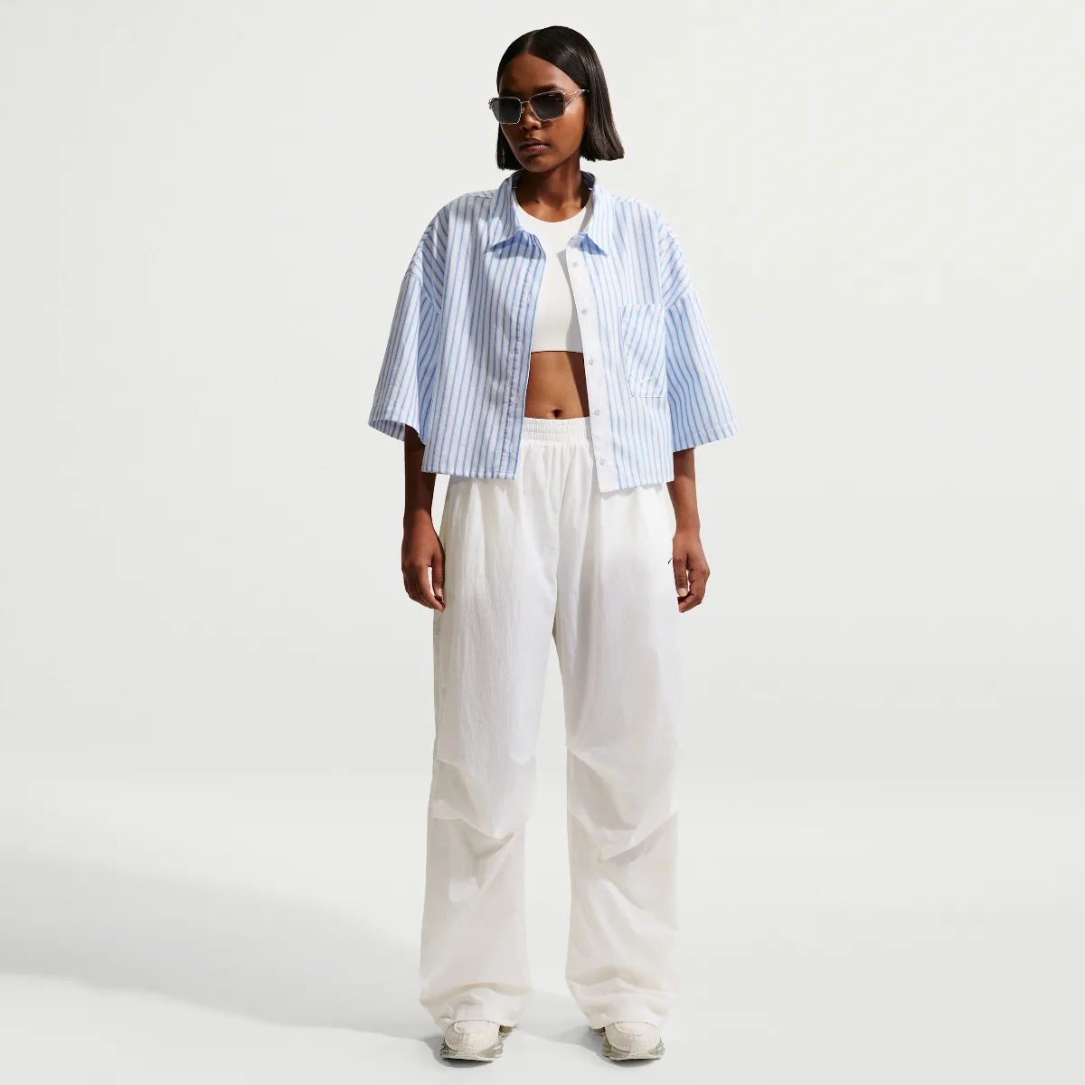 Sportswear Mid-Rise Lightweight UV Pants by Nike