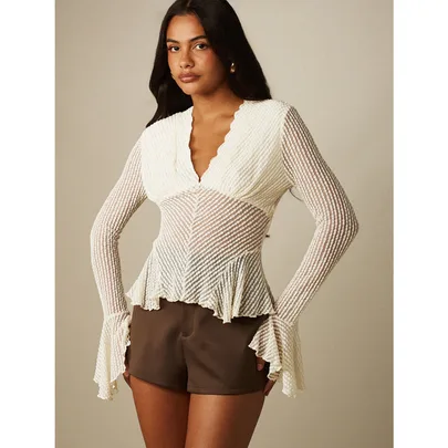 Semi-Sheer Mesh Knit Peplum Blouse with Deep V-Neck Bell Sleeves and Ruffle Hem Detail by MISSGUIDED