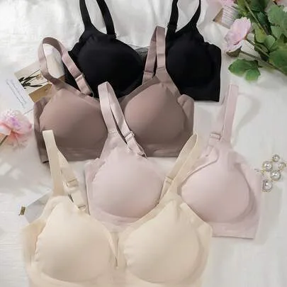 4-Piece Seamless Solid Color Wireless Sports Bra with Wide Shoulder Straps by SHEIN
