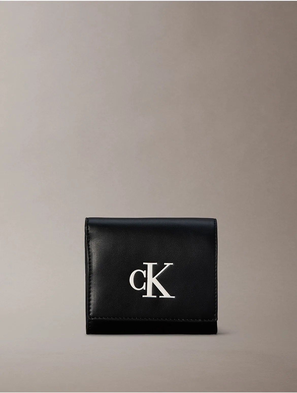 Embossed Monogram Bifold Wallet by Calvin Klein