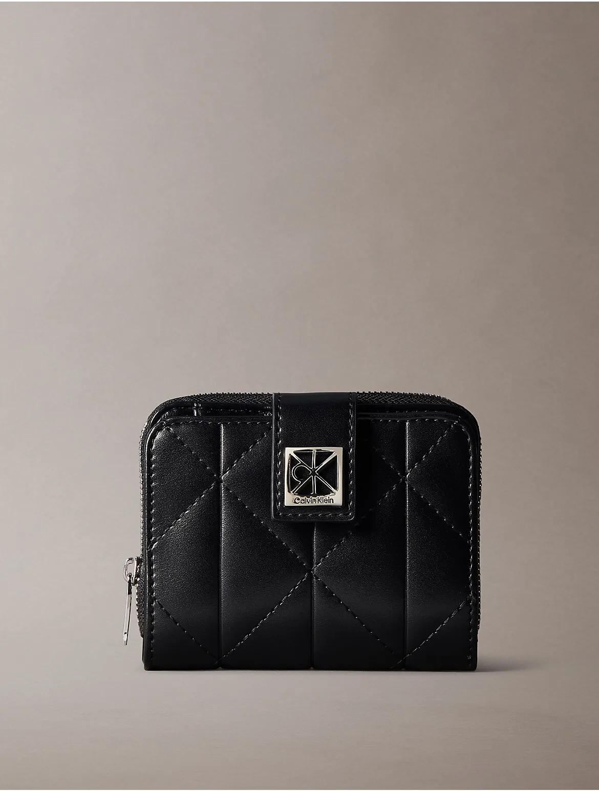 Quilted Emblem Flap Zip Wallet by Calvin Klein