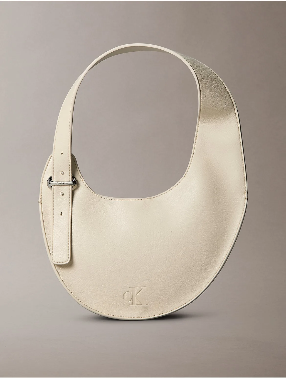 Crescent Asymmetrical Shoulder Bag by Calvin Klein