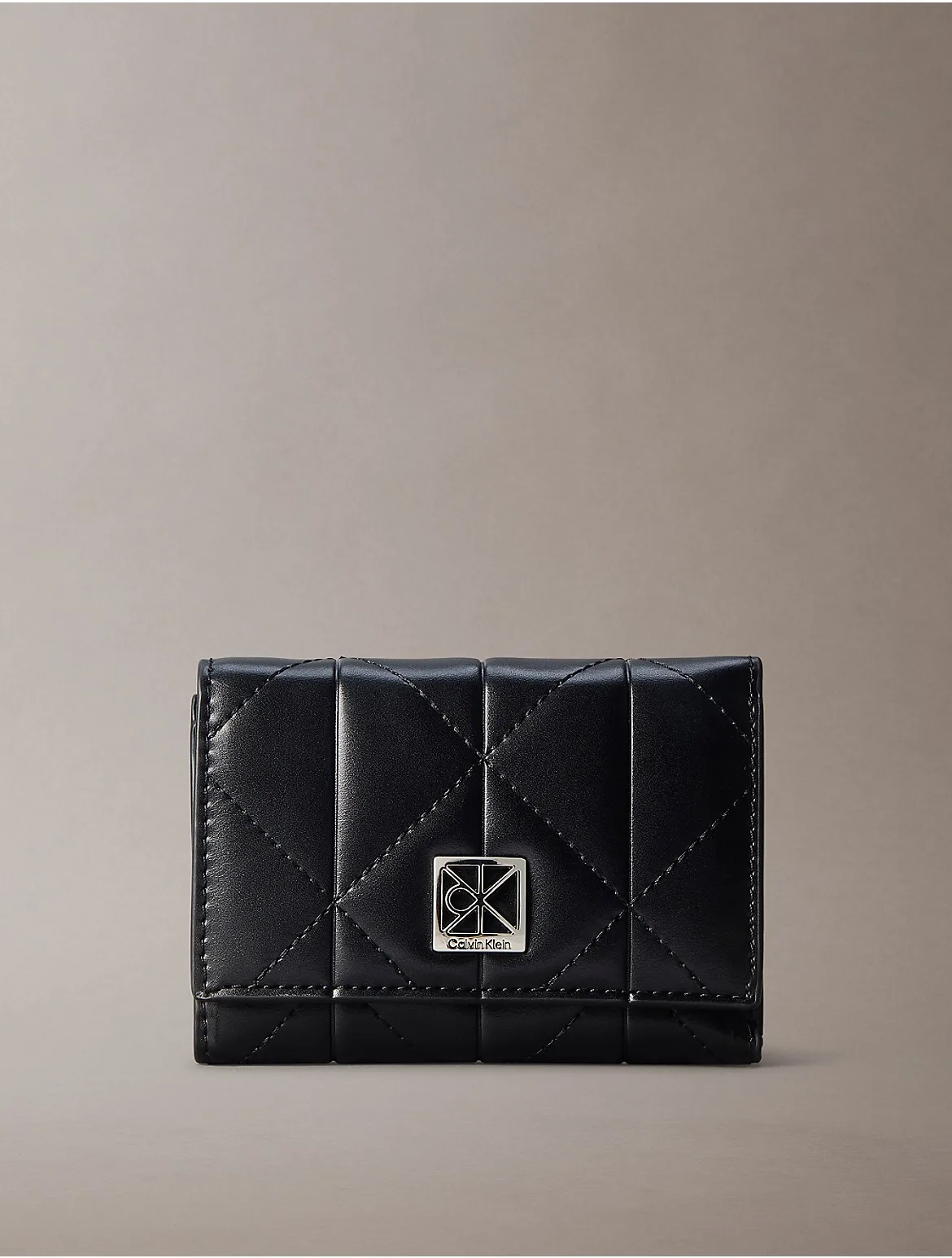 Quilted Zip Wallet by Calvin Klein