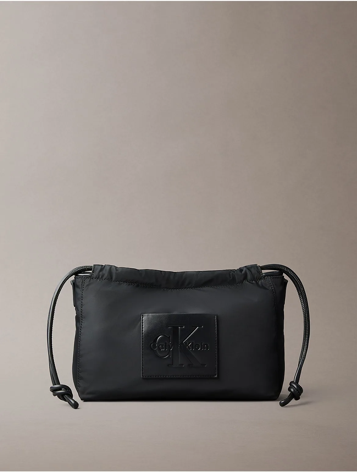 Nylon Drawstring Monologo Crossbody Bag by Calvin Klein