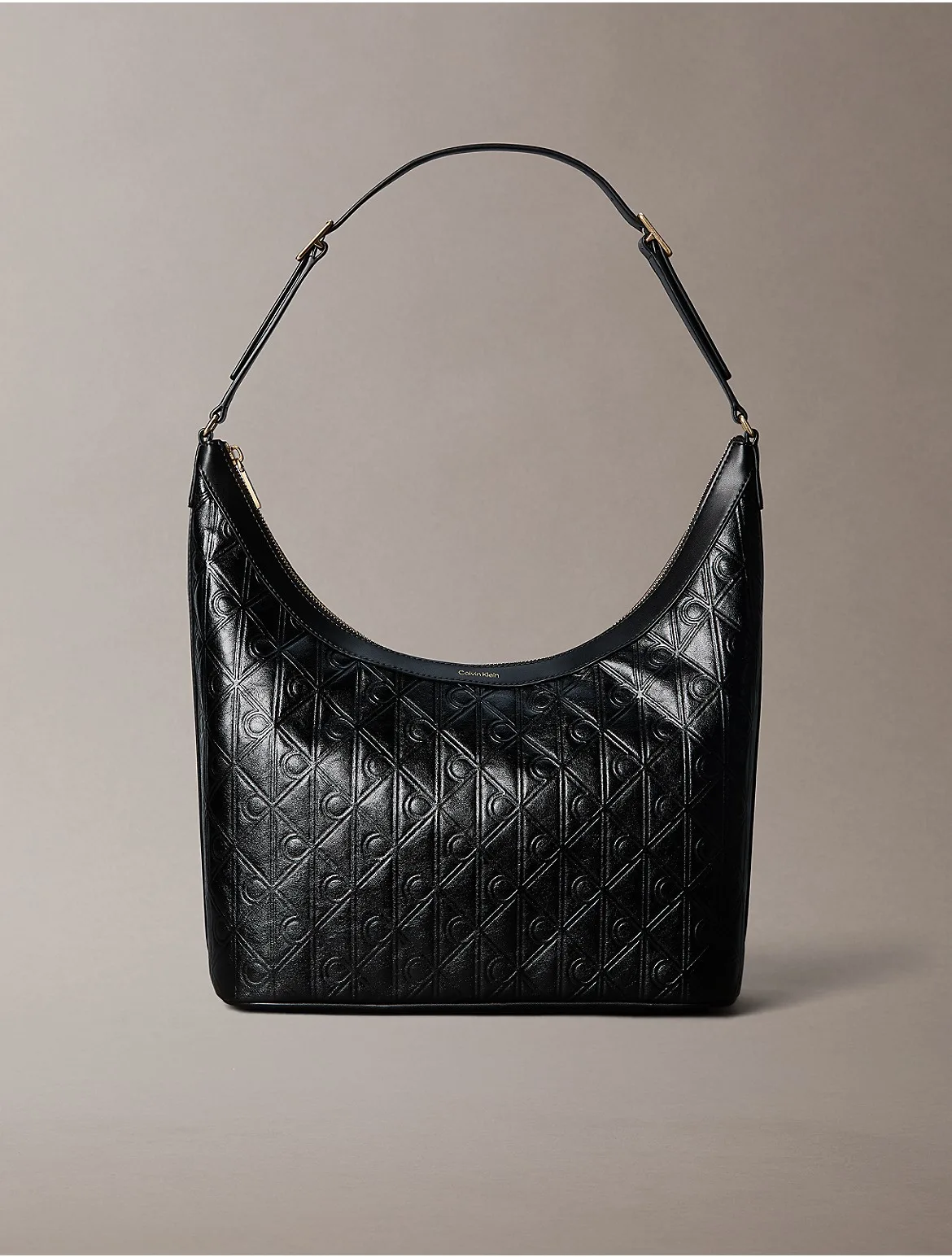 Debossed Allover Emblem Logo Shoulder Bag by Calvin Klein