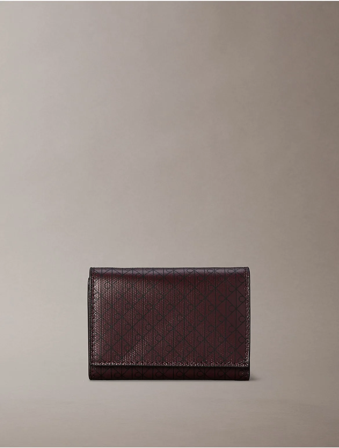 Allover Emblem Logo Trifold Wallet by Calvin Klein