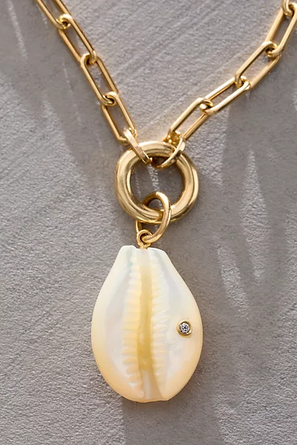 Small Cowrie Shell Charm by Maura Green