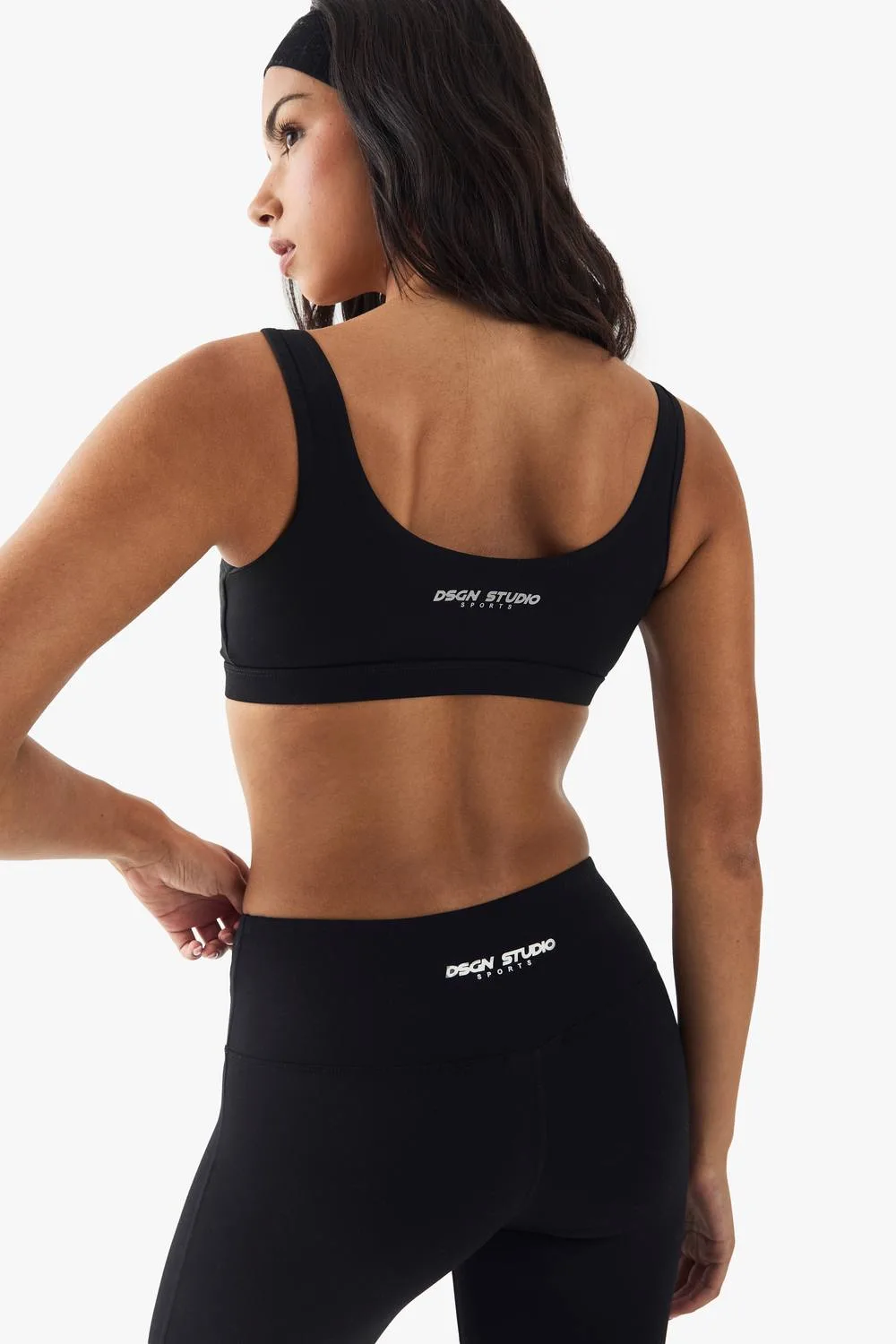 DSGN Studio Sport Zip Front Light Support Padded Sports Bra - Knitted by boohoo