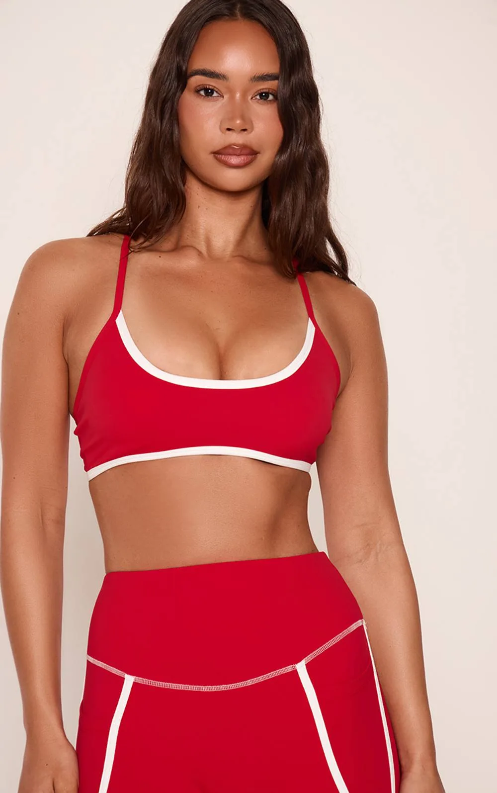PLT Red Sculpt Contrast Piping Sports Bra by PrettyLittleThing