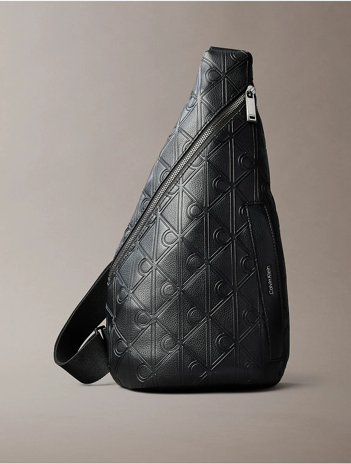 Debossed Allover Emblem Logo Sling Bag by Calvin Klein