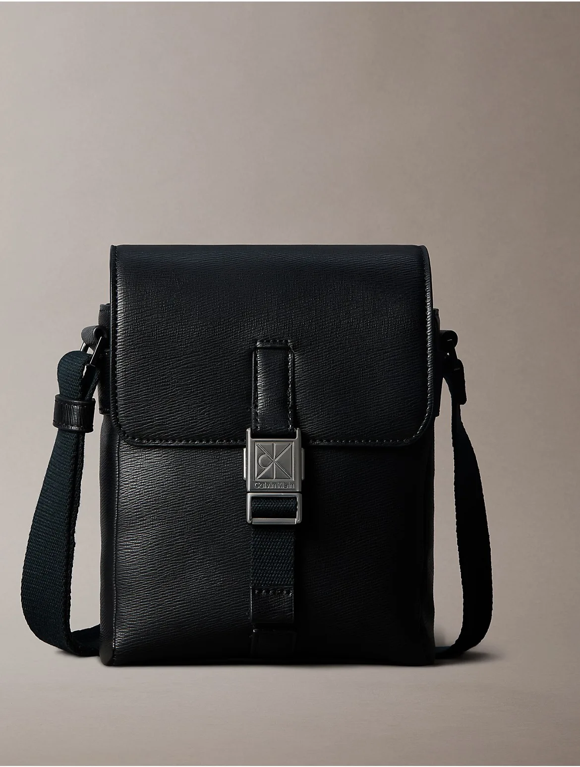 Emblem Logo Hardware Flap Reporter Bag by Calvin Klein