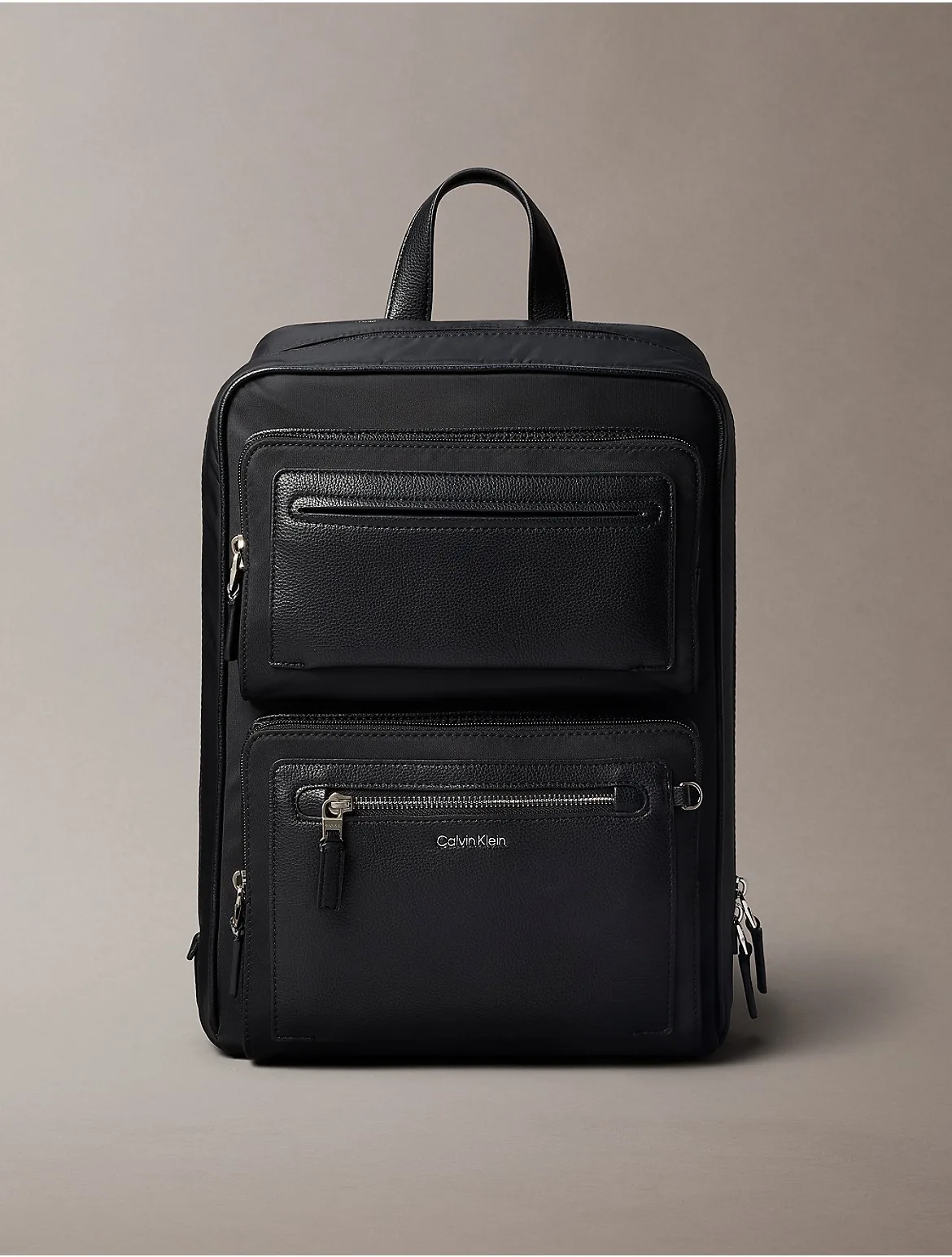 Hardware Logo Mixed Double Pocket Backpack by Calvin Klein