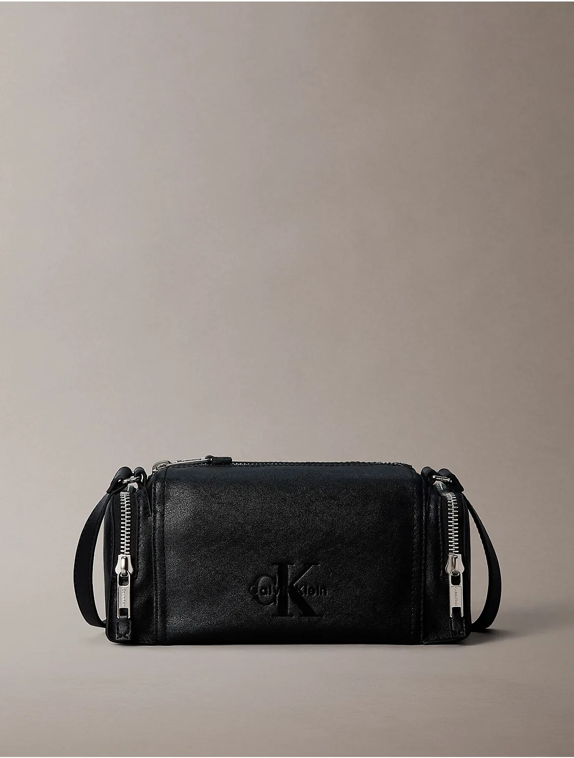 Embossed Monologo Zip Flight Bag by Calvin Klein