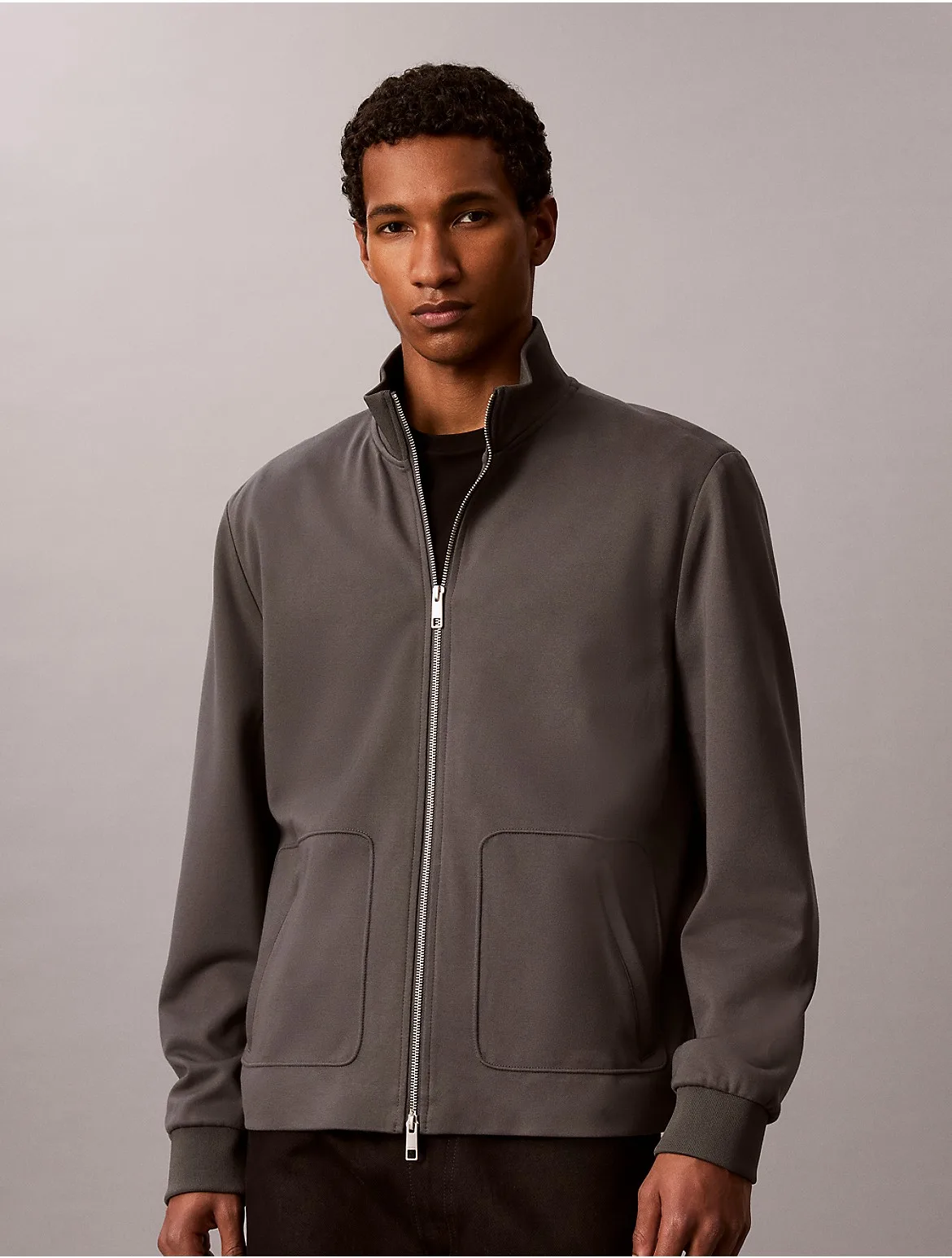 Tech Knit Zip Jacket by Calvin Klein