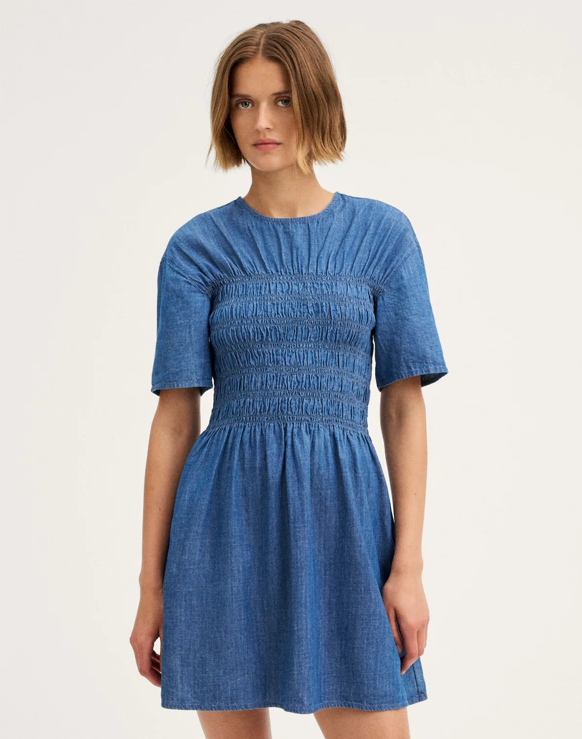 Denim Smocked Mini Dress by MW