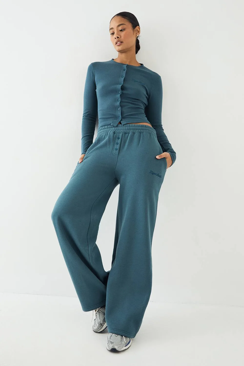 Embroidery Henley Jogger Pants by DSGN Studio