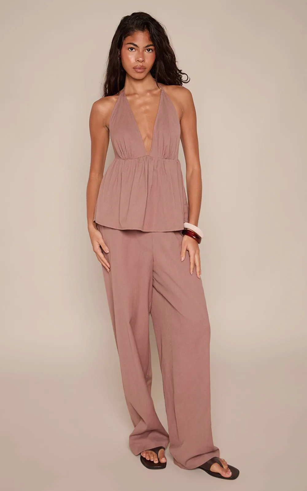 Linen Look Halter Neck Peplum Jumpsuit by PrettyLittleThing