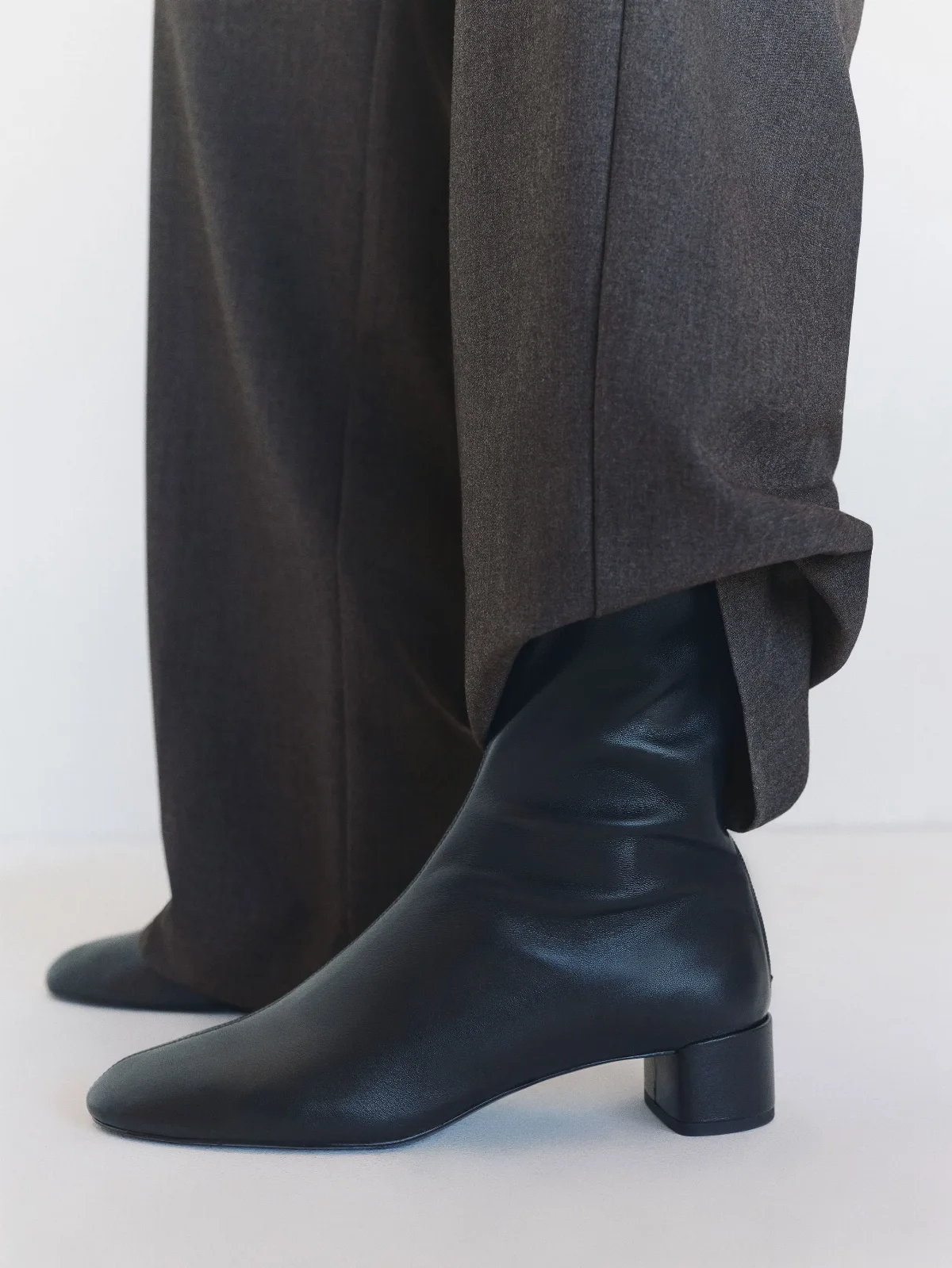 Aveline Block Heeled Ankle Boot Black Stretch Leather by Reformation