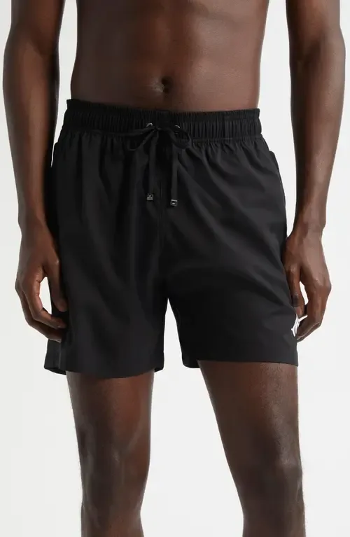 Core Logo Swim Trunks by AMIRI