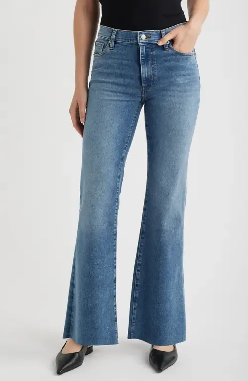 The Icon Raw Hem Flare Jeans by FRAME