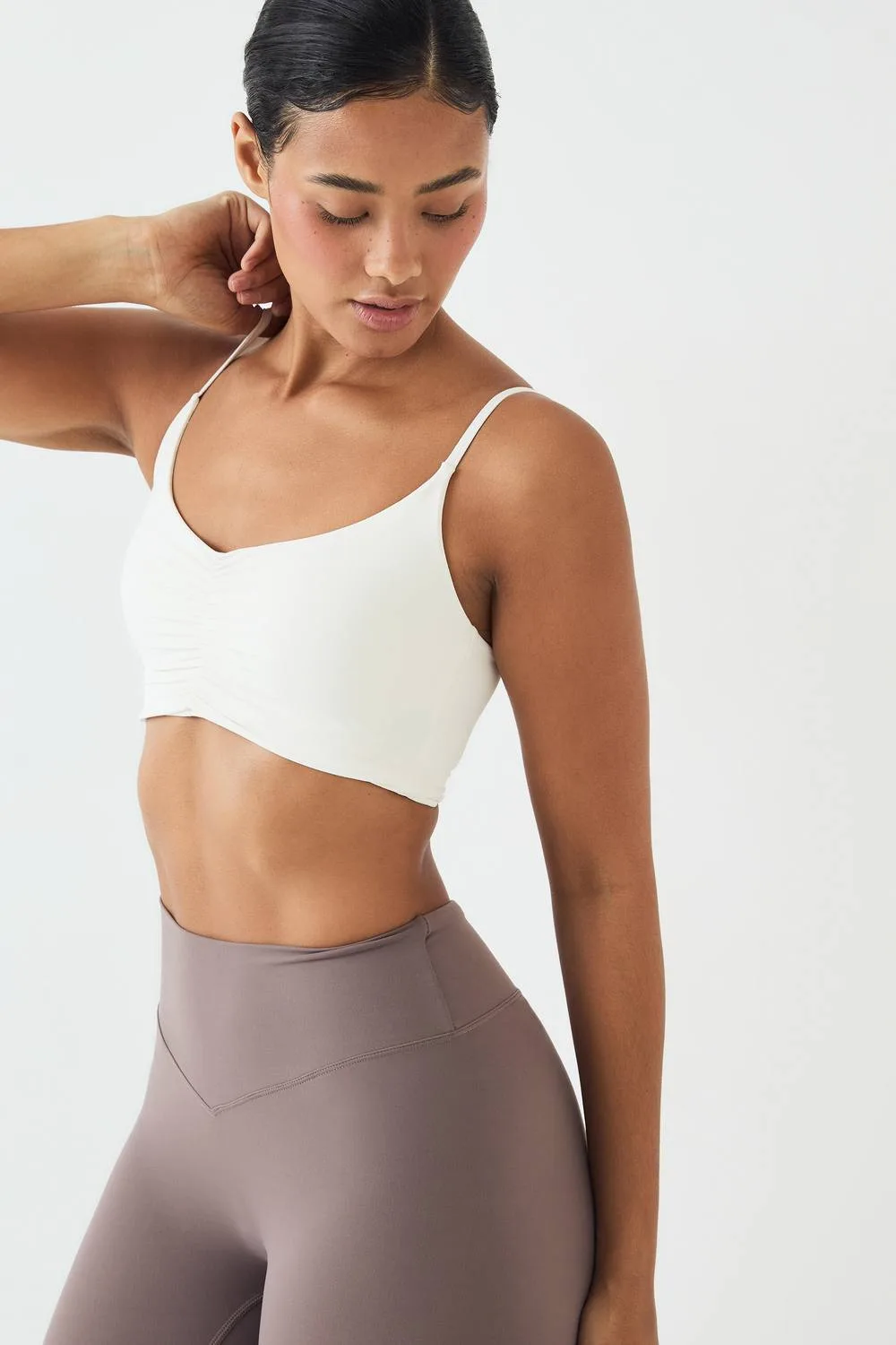 Soft Luxe Ruched Front Lettuce Edge Sports Bra by DSGN Studio