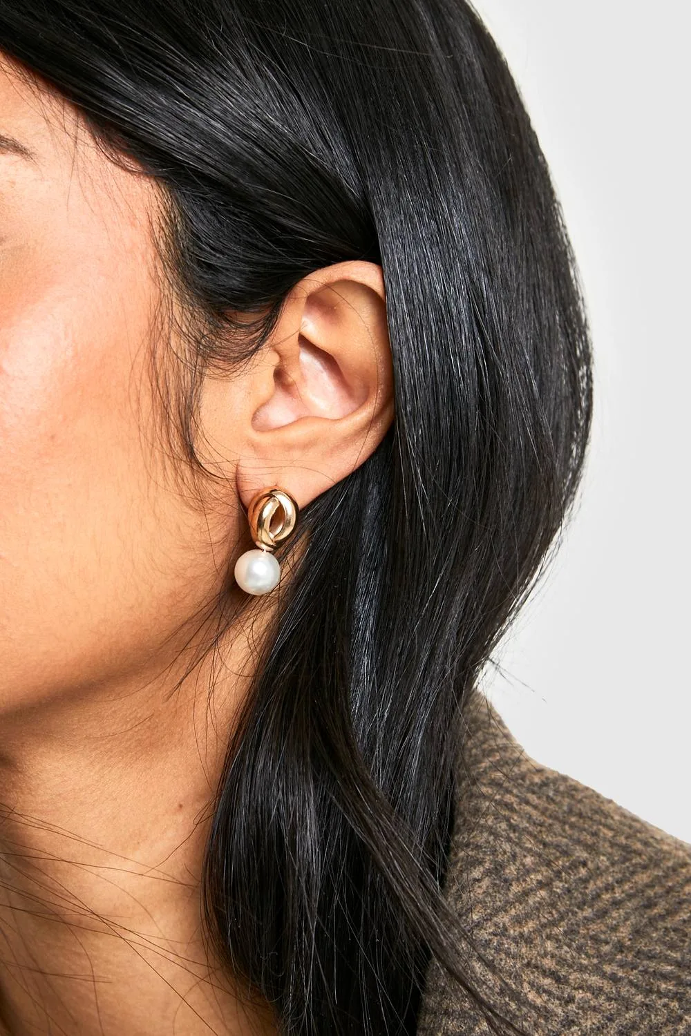 Twist Pearl Drop Earrings by boohoo