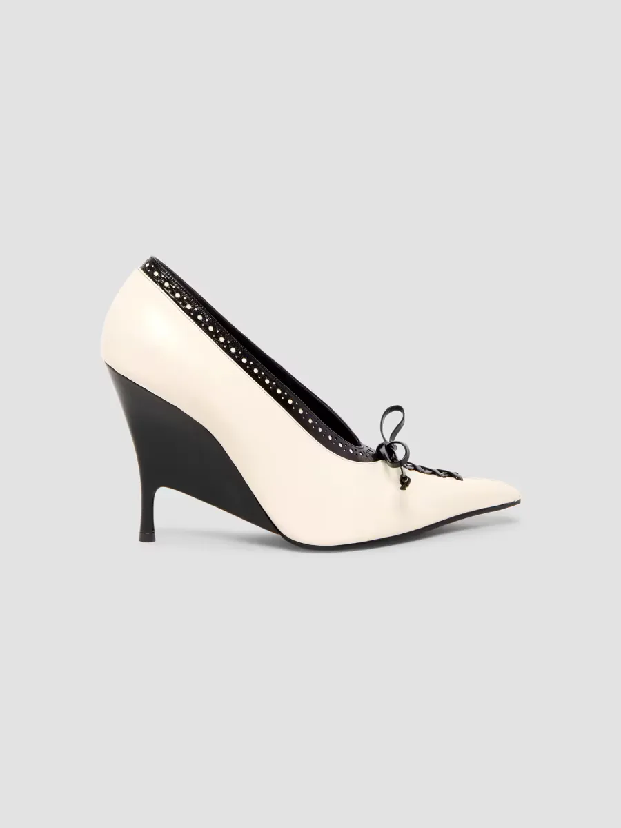 Koko 110MM Leather Wedge Pumps by McQueen