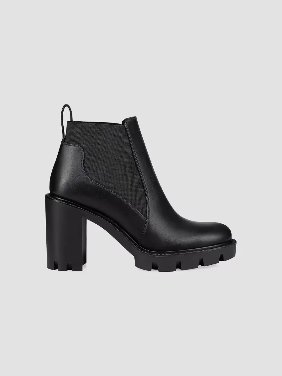 Marchacroche Lug Booties by Christian Louboutin