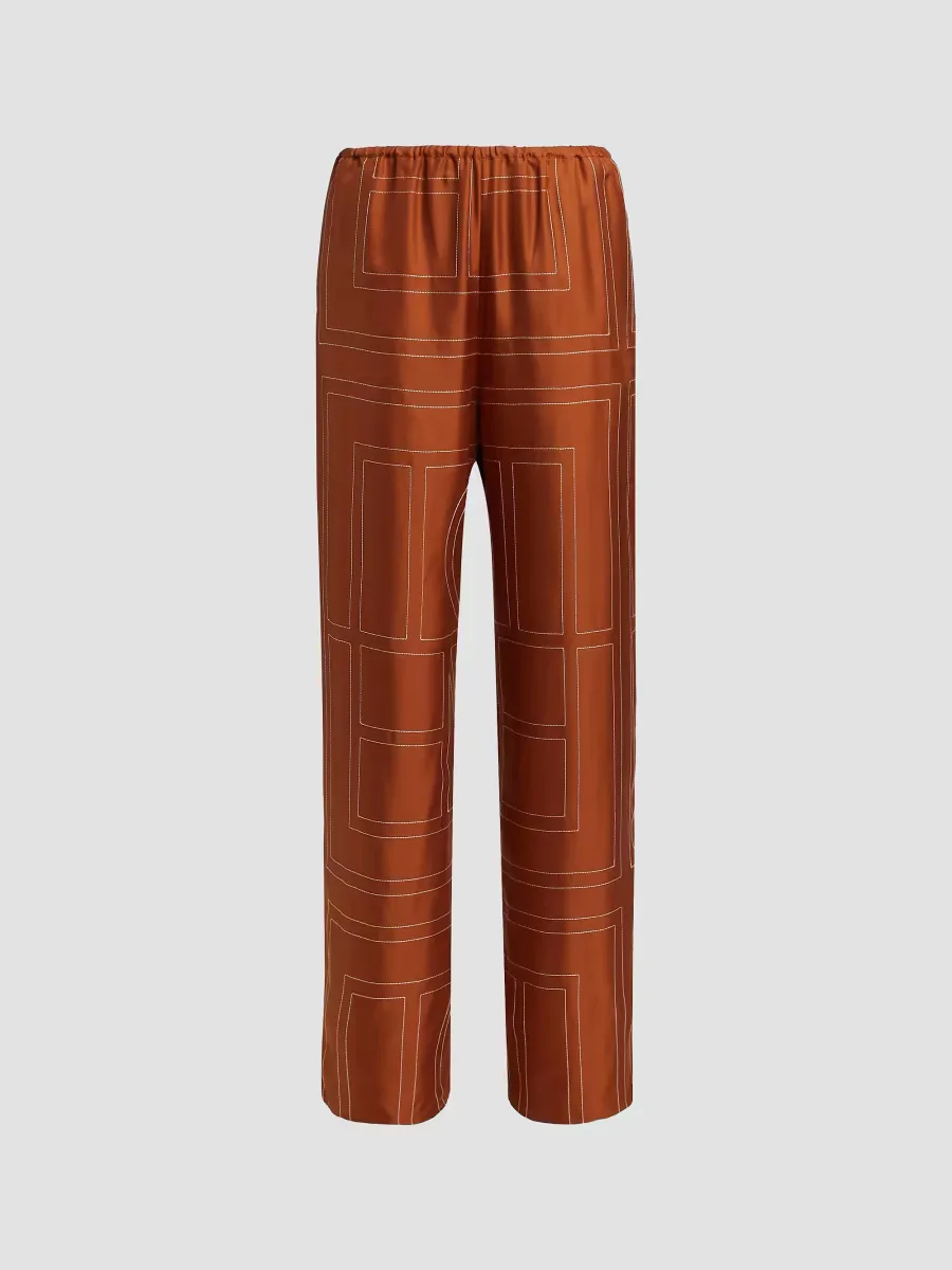 Monogram Stitch Silk Pants by Totême