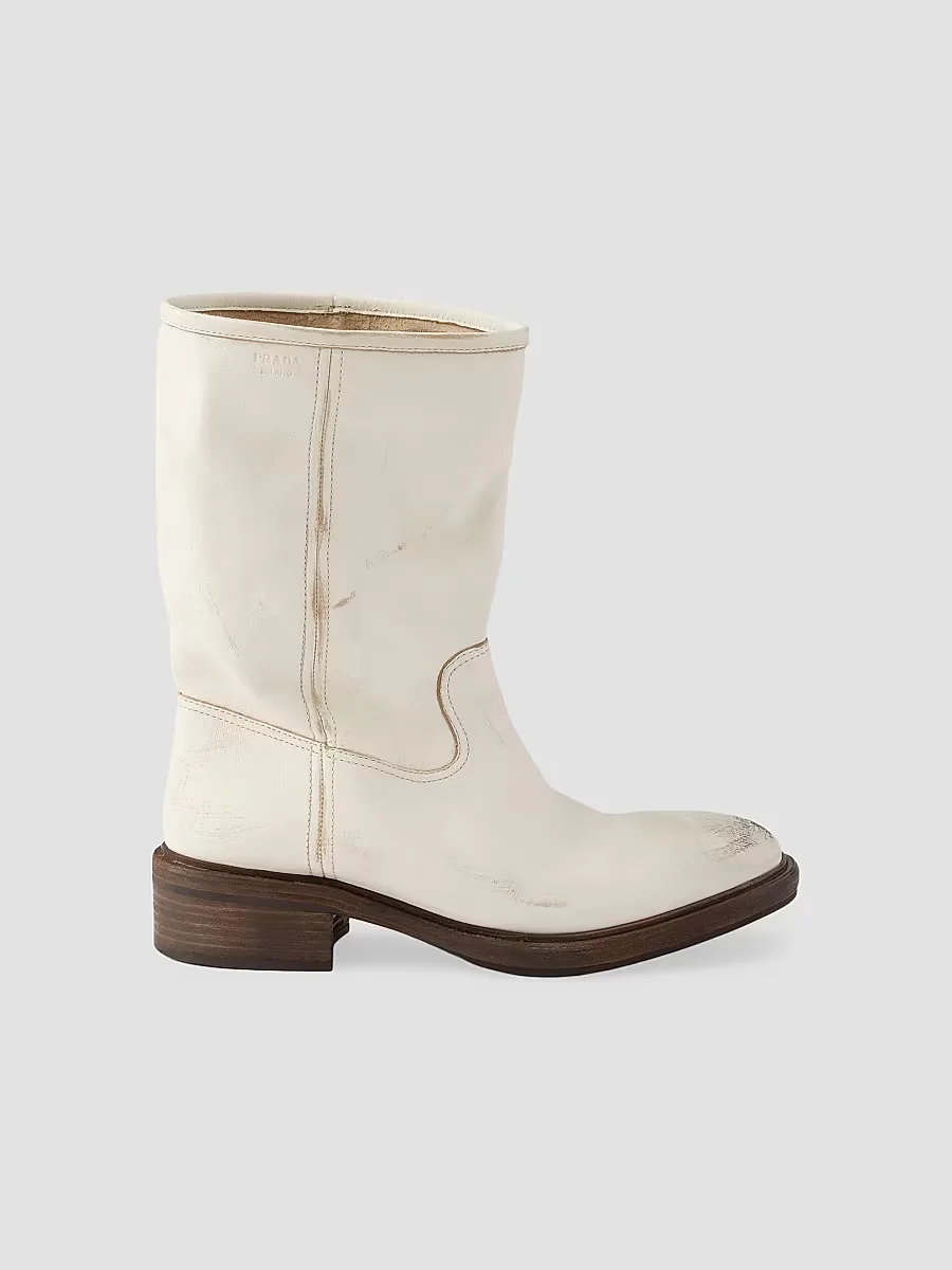 Vintage-Effect Leather Boots by Prada