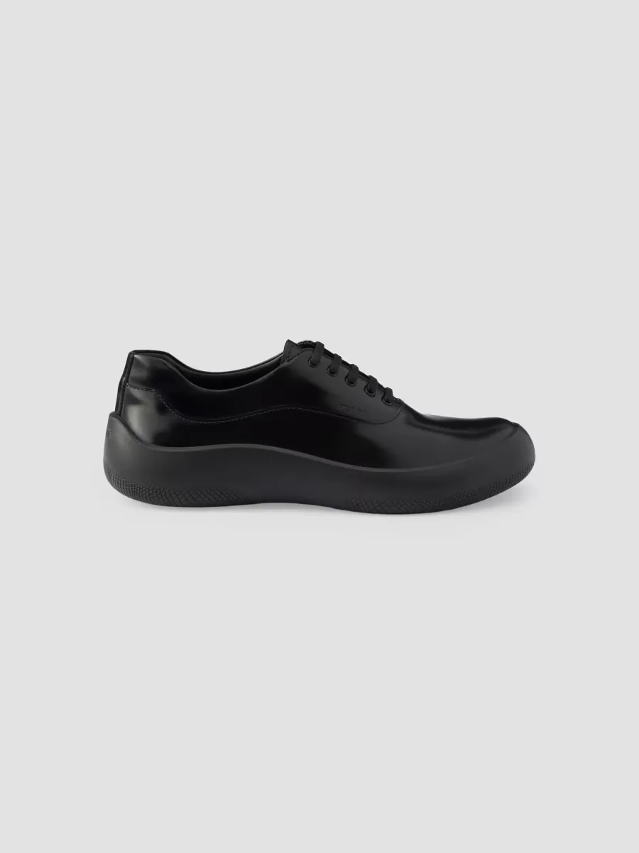 Brushed Leather Sneakers by Prada