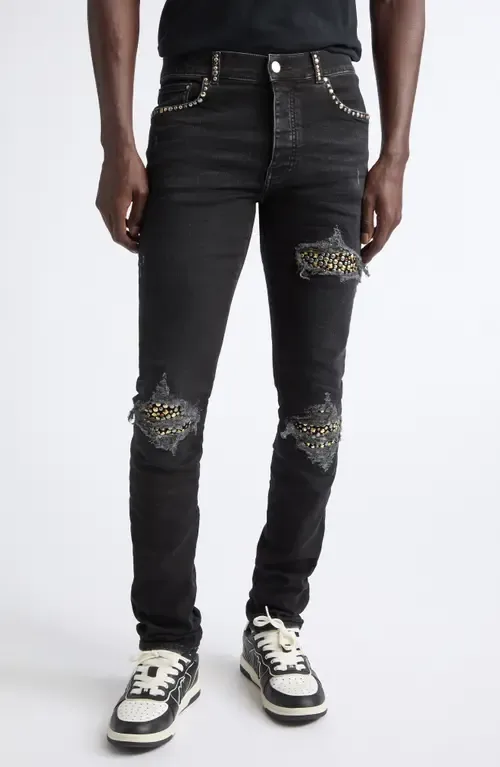 MX1 Studded Patch Ripped Skinny Jeans by AMIRI