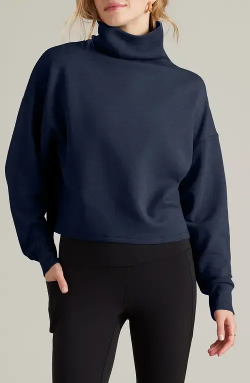 DreamGlow Mock Neck Top by Rhone