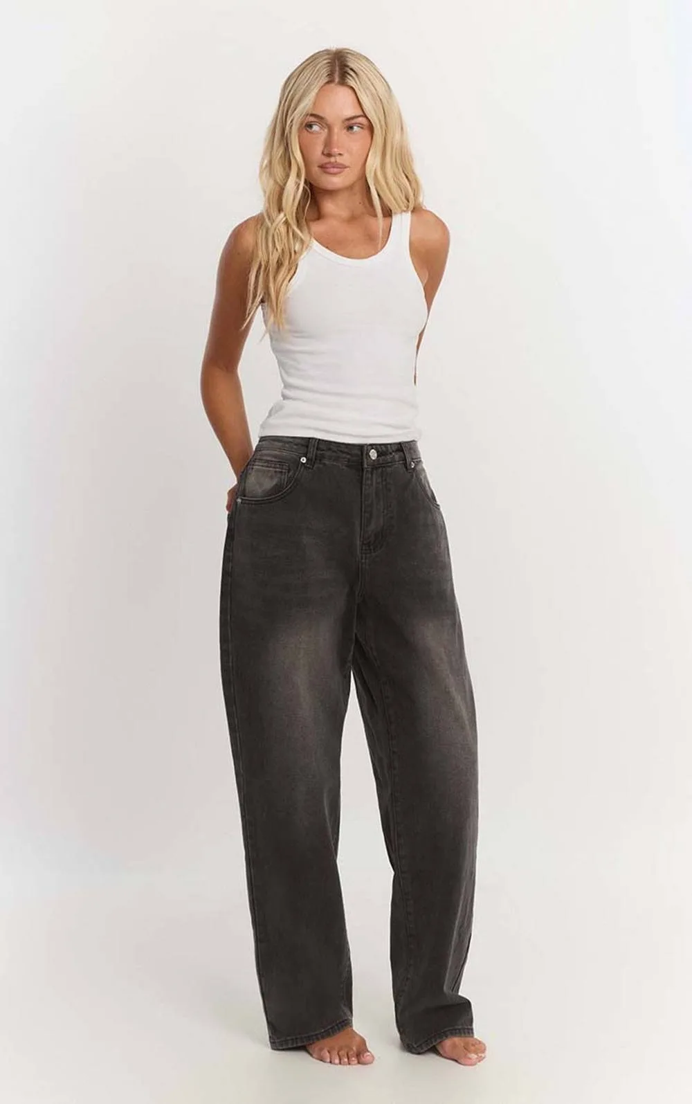 Wash Mid Rise Baggy Jeans by PrettyLittleThing