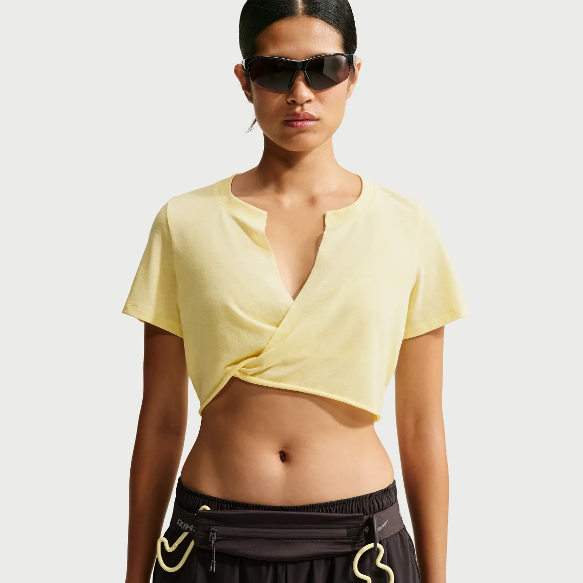 Nike SKIMS Performance Cotton Blend V-Neck Cropped Twist Short-Sleeve Top by Nike