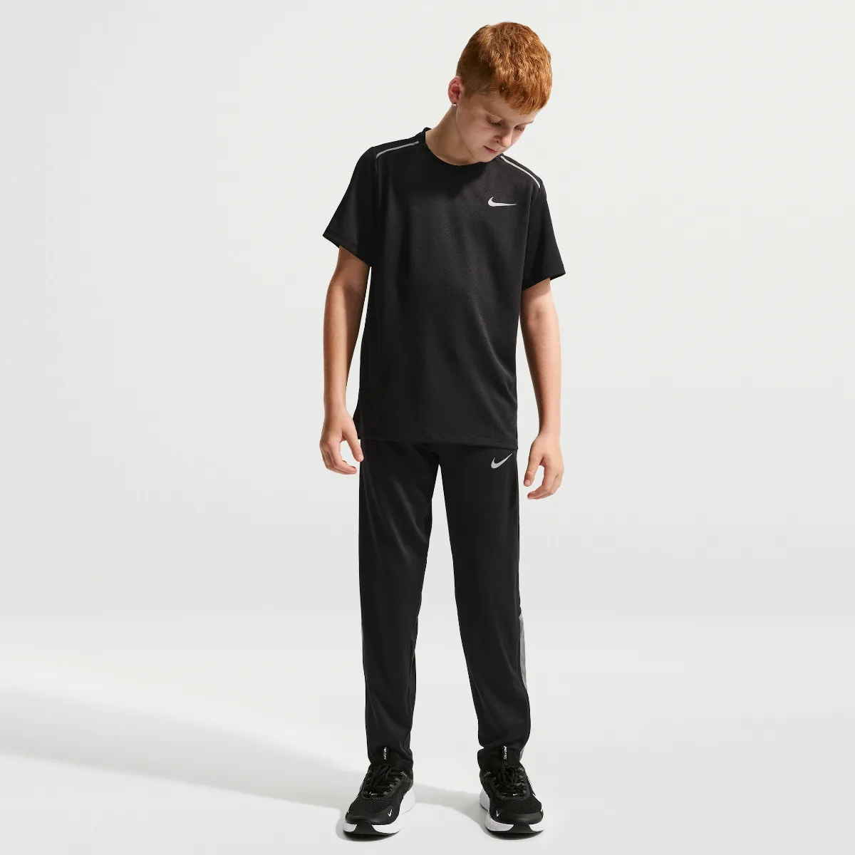Miler Knit Running Pants by Nike