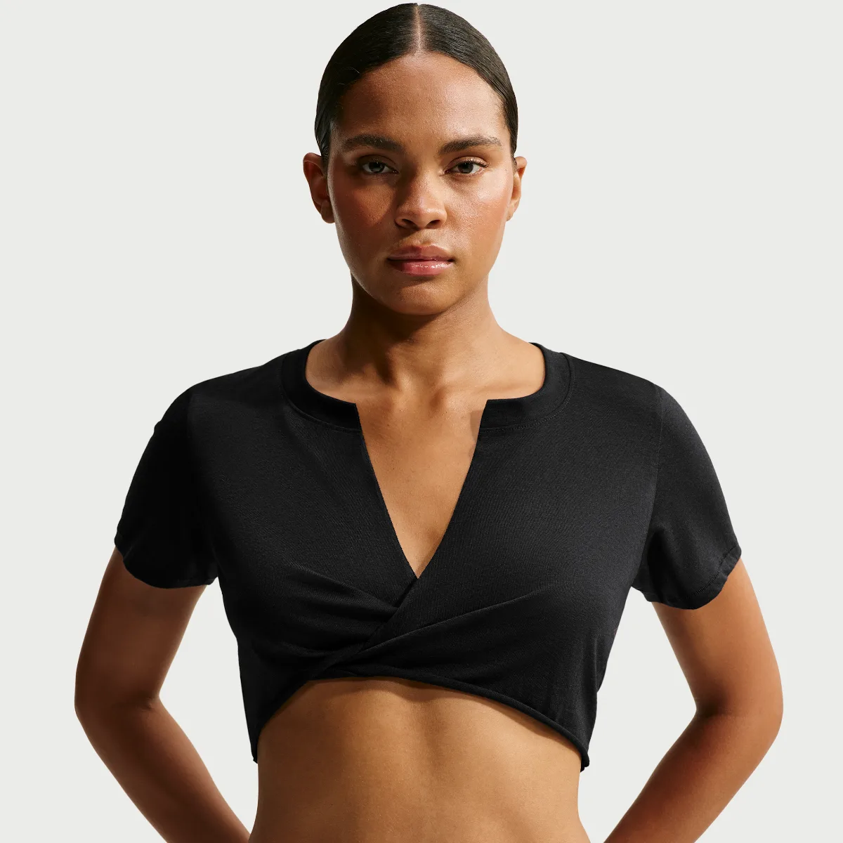 SKIMS Performance Cotton Blend V-Neck Cropped Twist Short-Sleeve Top by Nike