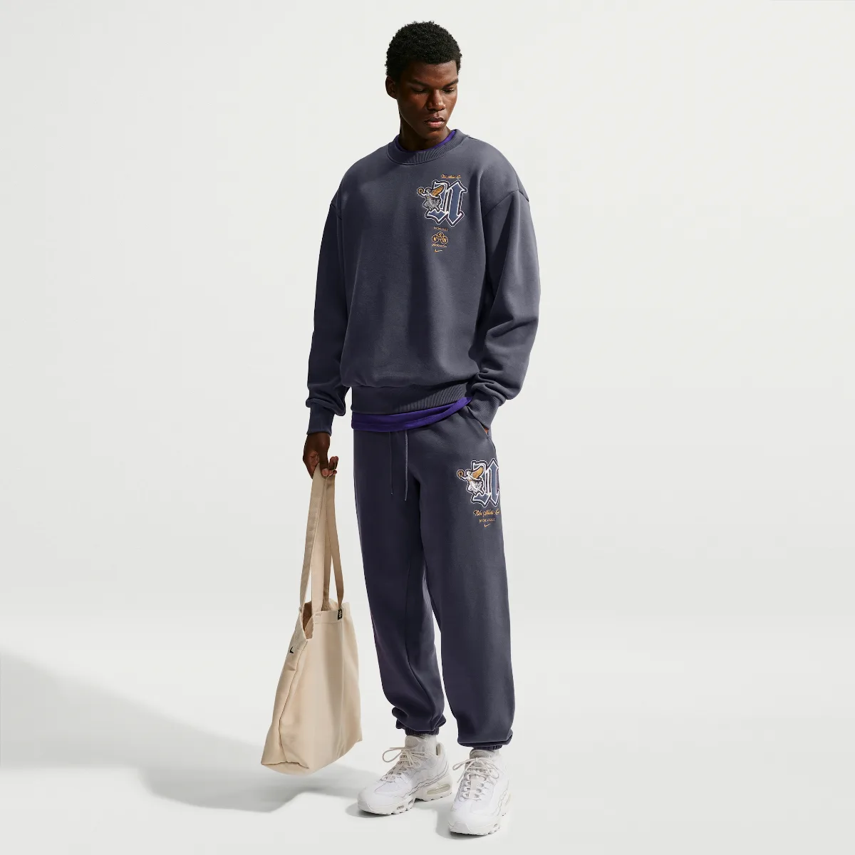 Solo Fleece Cuffed Pants by Nike