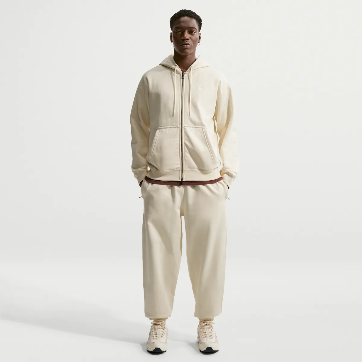 Solo Swoosh Cuffed Fleece Pants by Nike