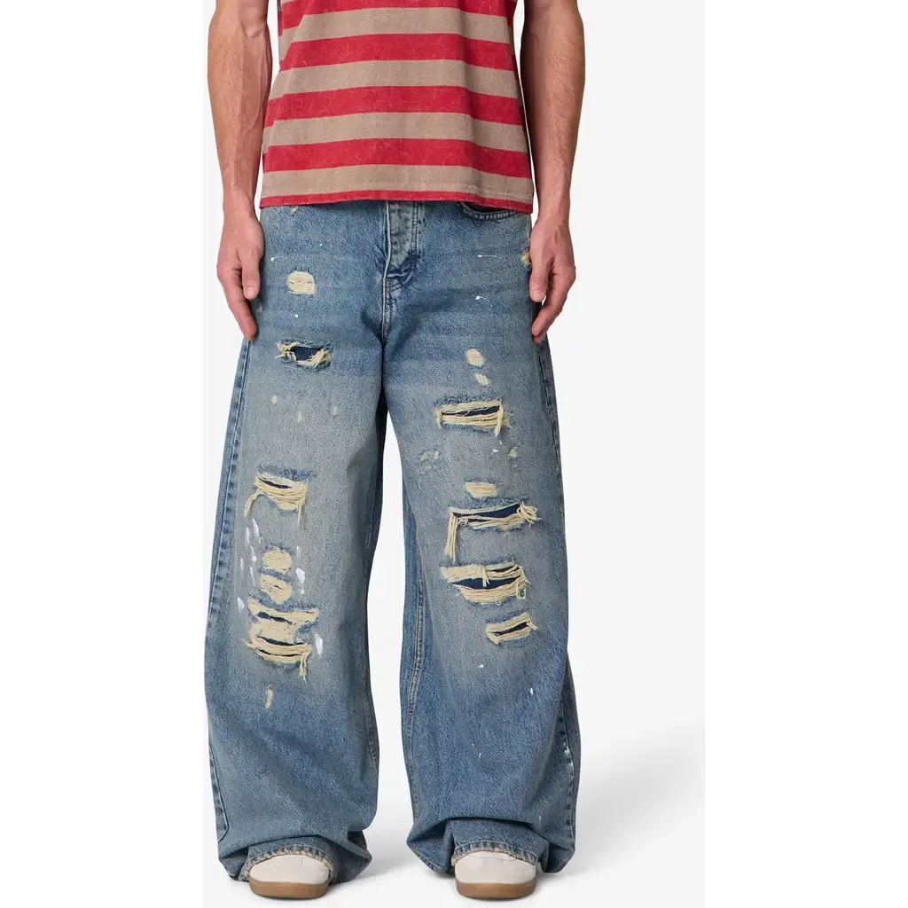 Repaired Rave Relaxed Fit Wide Leg Ripped Jeans by mnml