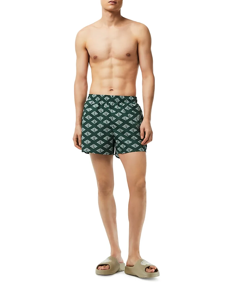 Two Tone Monogram Print Swim Trunks by Lacoste