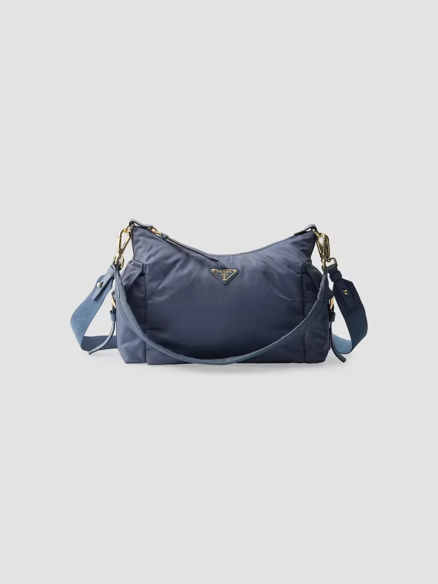 Explore Large Re-Nylon and Leather Shoulder Bag by Prada