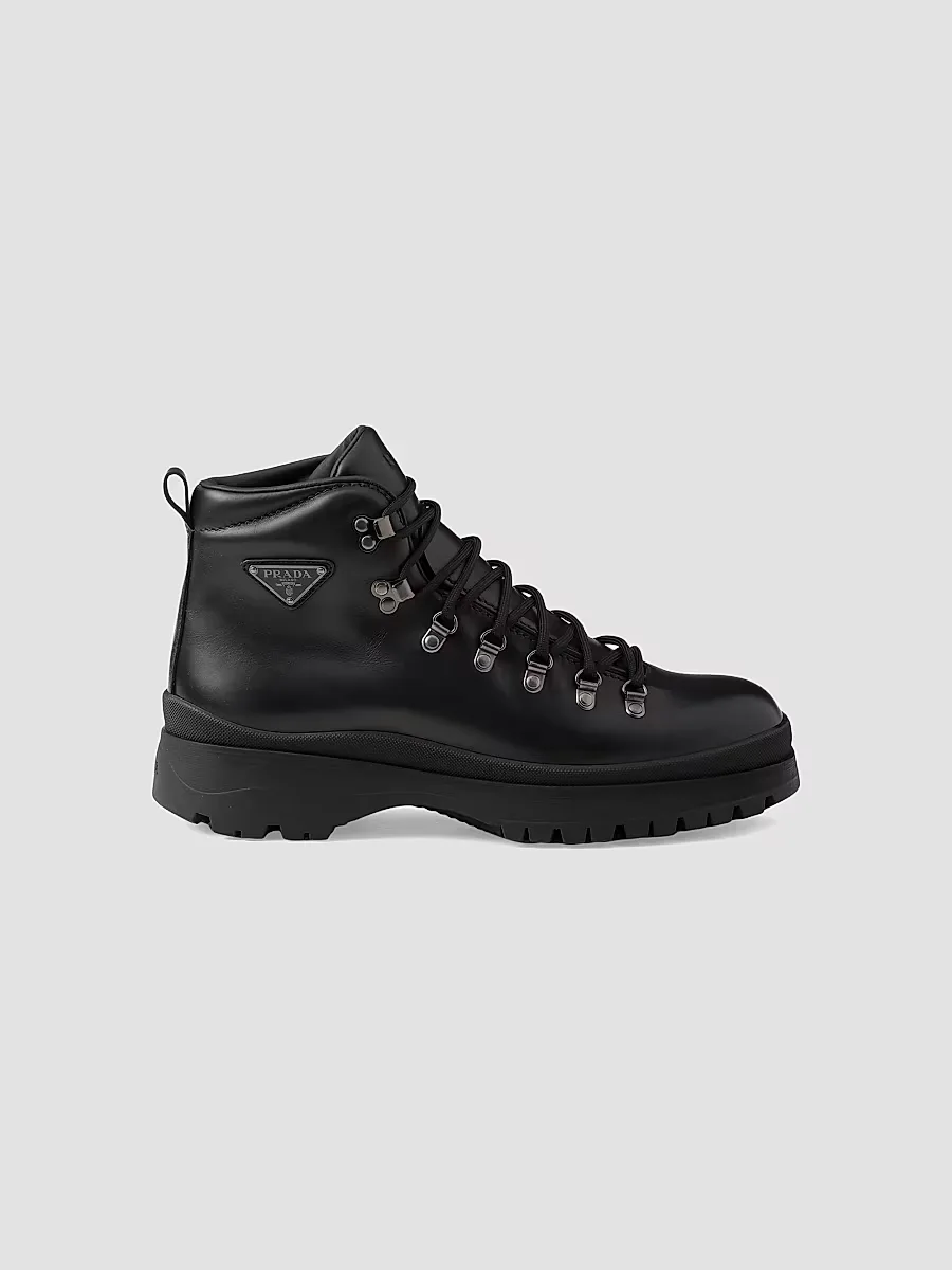 Brixxen Leather Booties by Prada