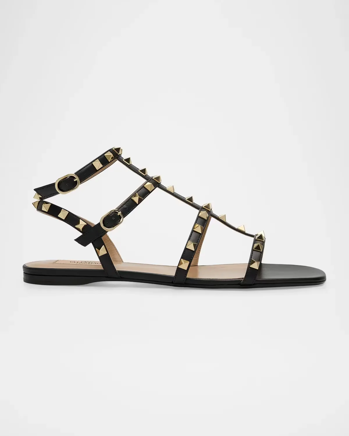 Rockstud Flat Leather Sandals by Valentino Garavani